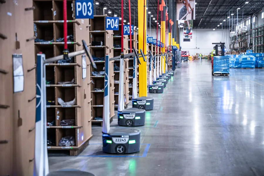 Long warehouse aisles lined with inventory racks