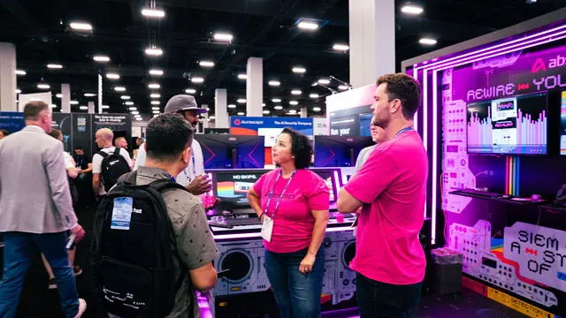Guests in conversation at the Abstract Security booth